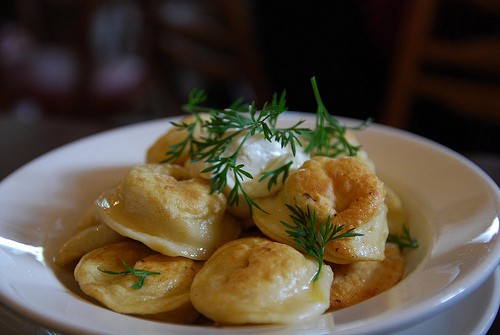Plated pierogies with Rosemary sprigs near apartments for rent in Boothwyn.