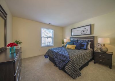 Furnished master bedroom in Meetinghouse apartment 